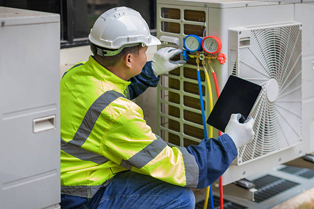 Professional Air Conditioning Repair technician working in Reinholds, PA